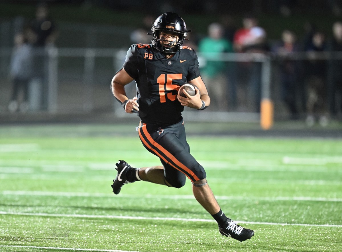 Massillon quarterback DaOne Owens takes off for a run against Valdosta (Georgia) on August 18, 2023. (Photo: Jeff Harwell) 